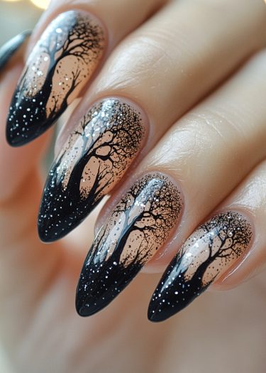 Elegant tree silhouette nail art with a captivating black to nude gradient and glitter accents.