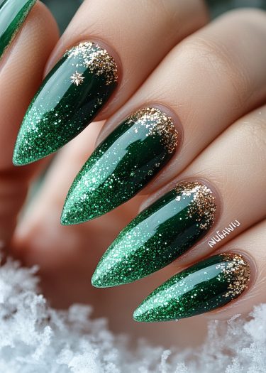 Emerald green and gold glitter festive nails with luxurious design and wintry accents.