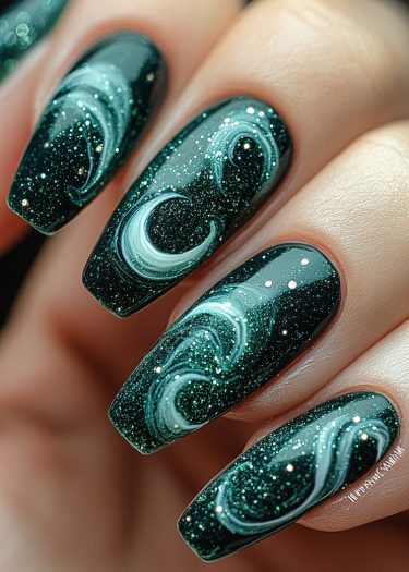 Elegant emerald green nails featuring intricate white swirl designs and sparkling glitter accents.