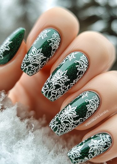 Elegant forest green lace nail art design perfect for winter beauty and manicures.