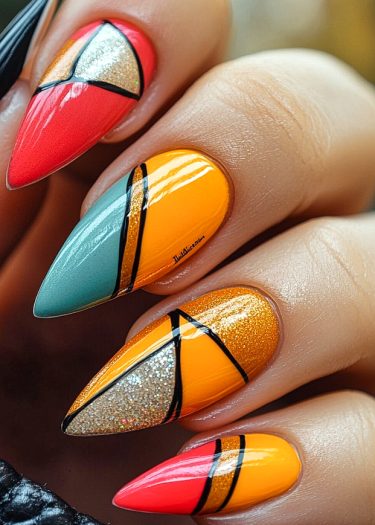 Vivid geometric nail art with glitter and sharp designs for a modern, glamorous look.