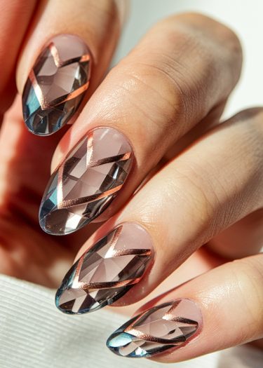 Elegant almond-shaped nails featuring stunning geometric nail art with copper accents.