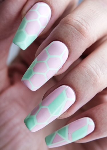 Elegant geometric pastel nail art design in pink and mint with a glossy finish.