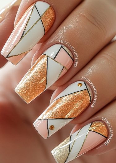 Elegant geometric peach and gold nail art with intricate designs and stylish textures.