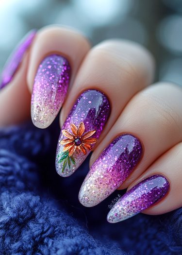 Glamorous gradient nails with 3D floral design and shimmering colors for stunning nail art.