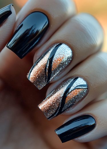 Elegant black and glitter nail art featuring striking designs and long square tips.