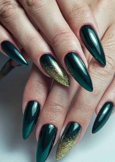 Elegant glossy green nails with gold accent, showcasing a luxurious and stylish manicure.