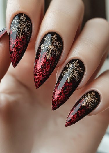 Elegant gothic ombre nail art with black, red, and gold intricate designs on long nails.