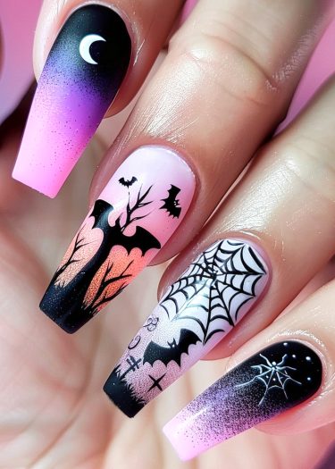 Halloween-themed coffin nails with intricate designs in black, pink, purple, and white.