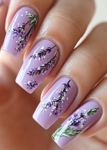 Lavender floral nail art with intricate designs and glossy finish for a sophisticated look.