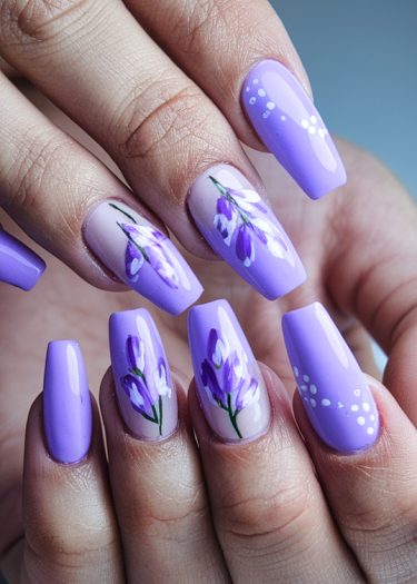 Elegant lavender floral nail art with intricate designs and glossy finish on square-shaped nails.