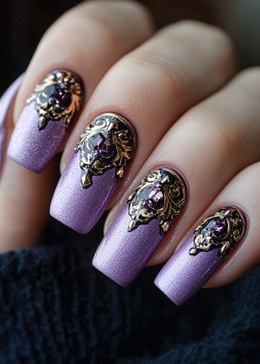 Elegant lavender metallic nail art with intricate gold filigree and sparkling gems.