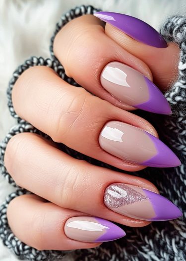 Elegant lavender-tipped almond nails with glitter accent for a chic manicure look.