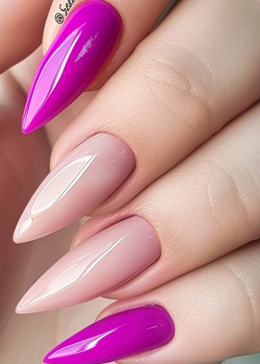 Elegant stiletto nails in fuchsia and nude, showcasing a glossy finish and modern design.