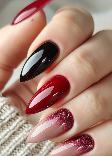 Stylish stiletto nails featuring vibrant colors and stunning glitter ombre designs.