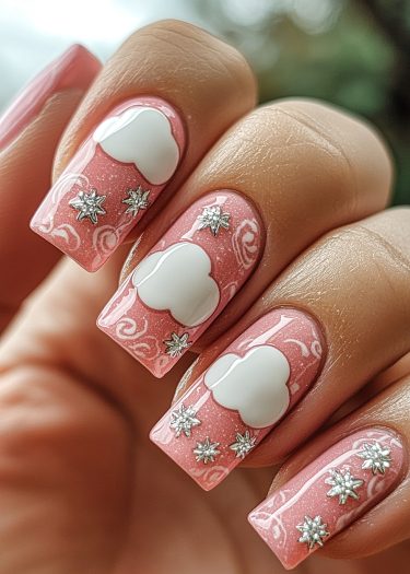 Elegant pink nails with whimsical clouds and sparkling stars for a dreamy manicure.