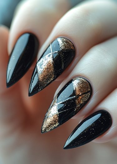 Sophisticated stiletto nails with glossy black polish and glittery gold argyle design.