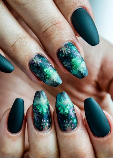 Elegant matte black nails with vibrant artistic designs featuring aquatic and floral motifs.