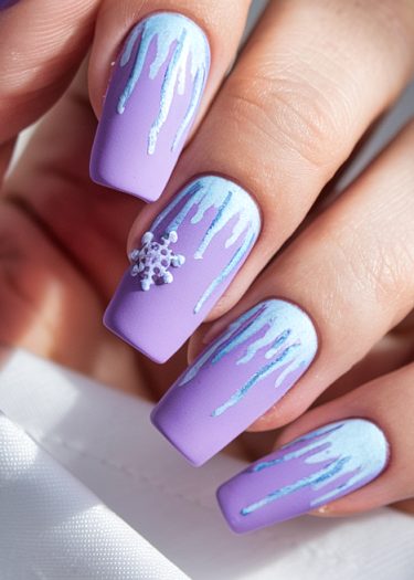 Elegant matte lavender nail art with icy designs and a 3D snowflake for winter.