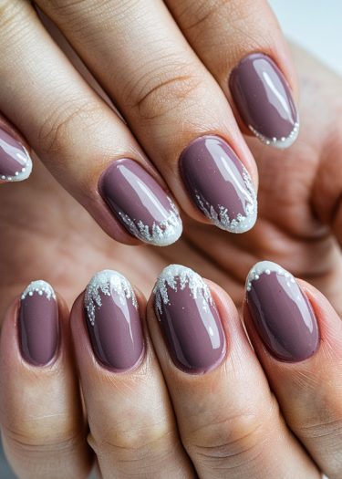 Elegant mauve almond nails with frosted white tips, showcasing stylish seasonal nail art.