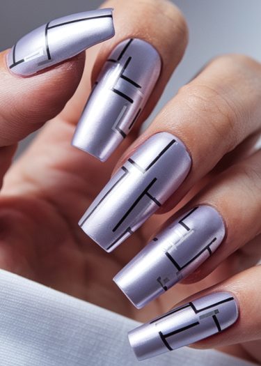 Elegant metallic lavender nails with black geometric designs showcase modern nail art artistry.