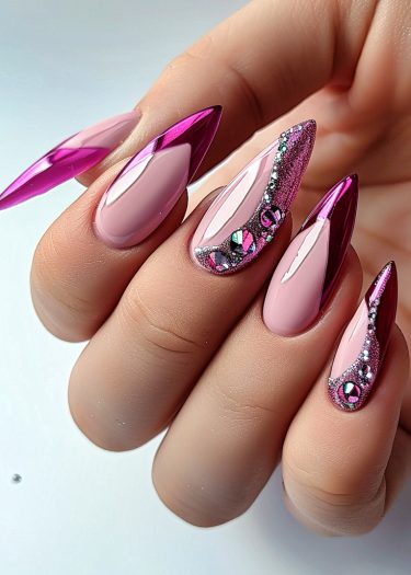 Stunning stiletto nails in metallic magenta with intricate designs and rhinestone accents.