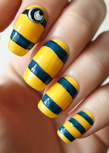 Vibrant minion-inspired nail art with detailed designs and glossy finishes showcasing playful character themes.