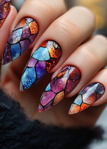 Ornate mosaic stained glass nail art in vibrant colors; unique designs for stunning manicure.