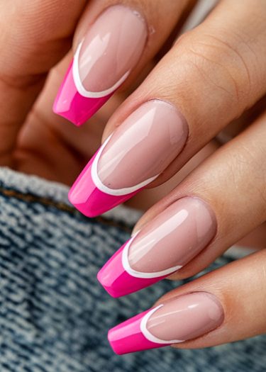 Elegant nude and pink coffin nails with a glossy finish and modern French design.