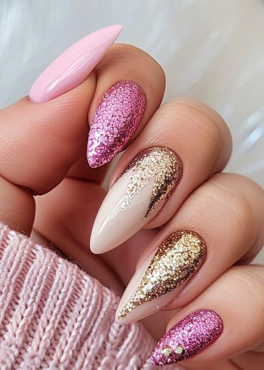 Elegant pastel and glitter nail art design on almond-shaped nails with gold accents.