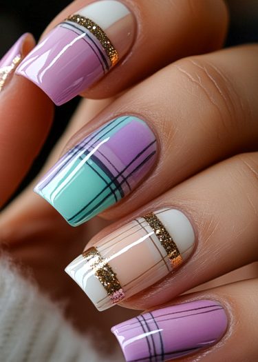 Pastel geometric nail art featuring plaid designs in lavender, mint green, and beige hues.