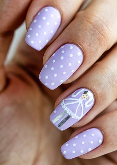 Lavender nail art with playful polka dots and whimsical character design for elegant style.