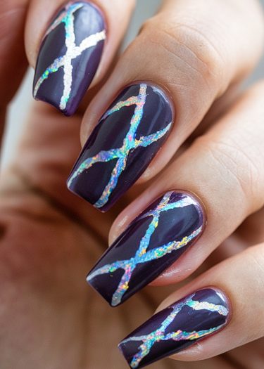 Elegant purple holographic nail art with intricate iridescent lightning designs for striking beauty.