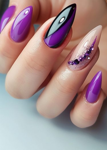 Elegant purple nail designs with black and nude accents featuring intricate artwork and glitter.