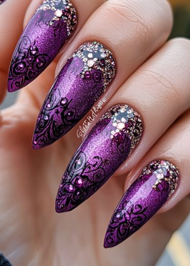 Elegant metallic purple nails with intricate black lace patterns and sparkling rhinestones.