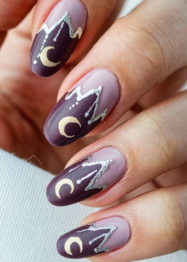 Elegant purple crescent moon nail art with shimmering gold and silver mountain designs.