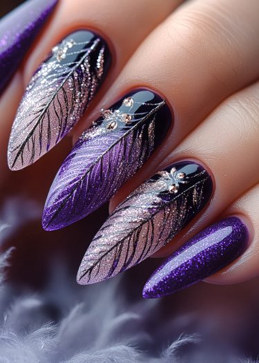 Elegant plum almond nails with stunning feather designs and sparkling embellishments.