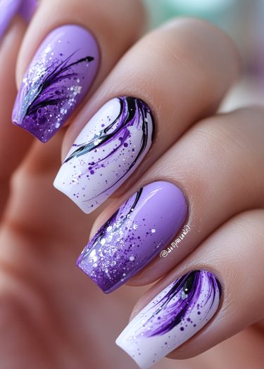 Elegant purple and white nail art with glitter, showcasing intricate designs and almond-shaped nails.