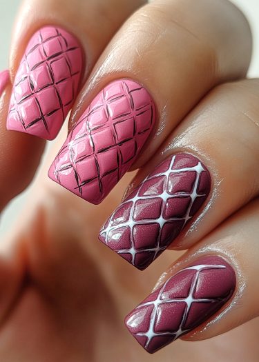 Quilted pink and mauve nail art design with diamond patterns and glossy finish.