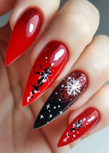 Stunning red and black stiletto nail art featuring intricate snowflake designs and glitter accents.