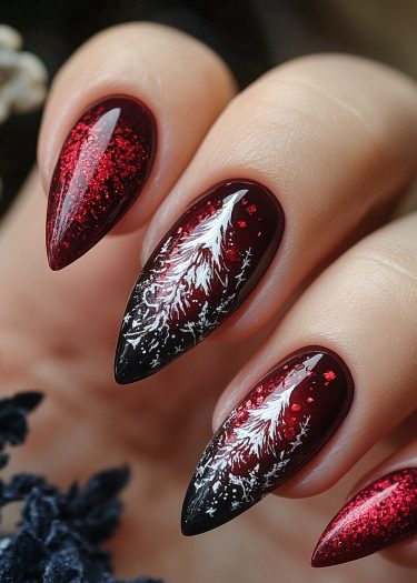 Stunning burgundy nail art featuring glitter and intricate white feather patterns.