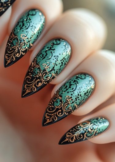 Elegant stiletto nails in shimmering green with intricate gold and black designs.