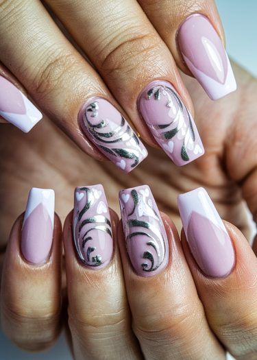 Elegant soft pink swirl nail art with black patterns and heart accents for chic style.