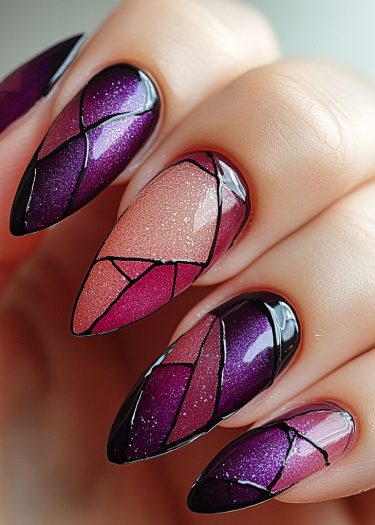 Stunning stained glass nail art with elegant stiletto tips in vibrant hues of purple, pink, and peach.