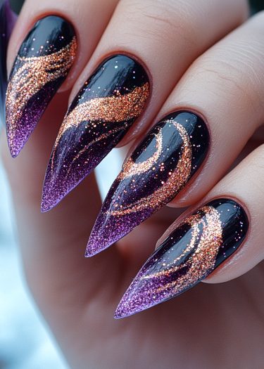 Glamorous stiletto black nails with vibrant purple and gold glitter designs for a stunning look.