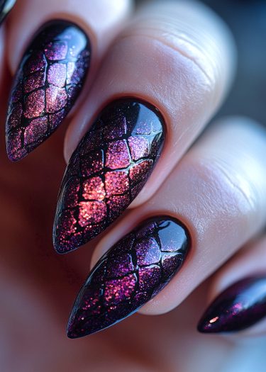 Elegant stiletto nails with black base and shimmering glitter scale pattern.