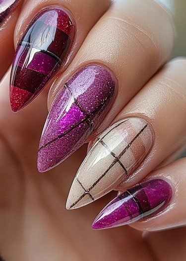 Stiletto nail art featuring vibrant colors, glitter, and geometric patterns for a bold look.