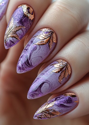 Elegant almond-shaped lavender nails with intricate floral designs and metallic accents.