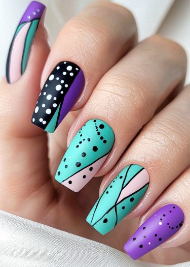 Stylish matte nail art featuring vibrant colors and unique patterns for a chic look.