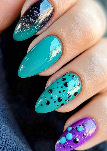 Vibrant teal and purple nail art featuring glitter, polka dots, and galaxy effects.